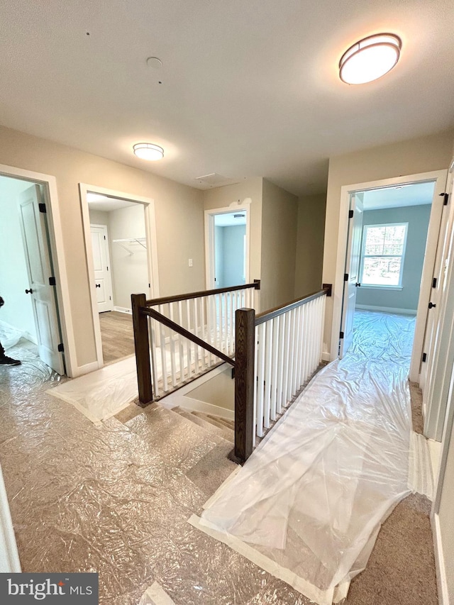4655 Mountain Rd, Pasadena, MD 21122 - corridor featuring an upstairs landing and baseboards