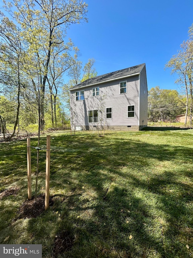 4655 Mountain Rd, Pasadena, MD 21122 - rear view of house with a yard