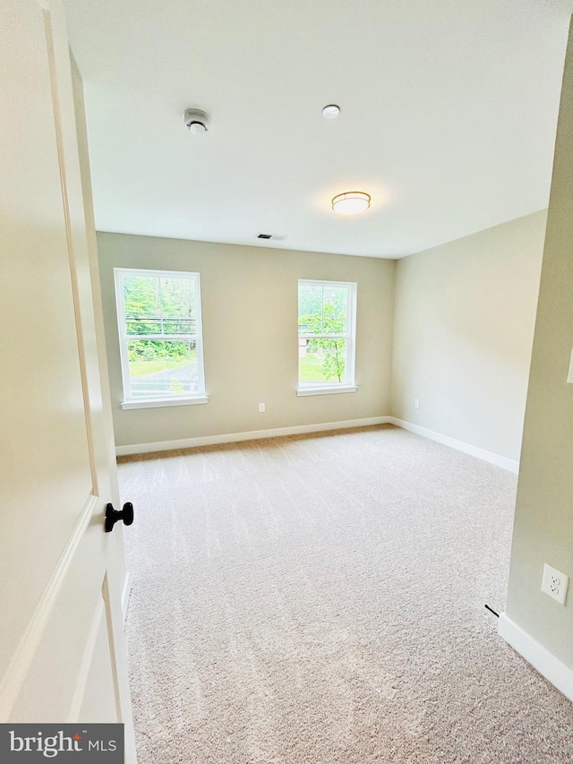 4655 Mountain Rd, Pasadena, MD 21122 - empty room featuring carpet and baseboards
