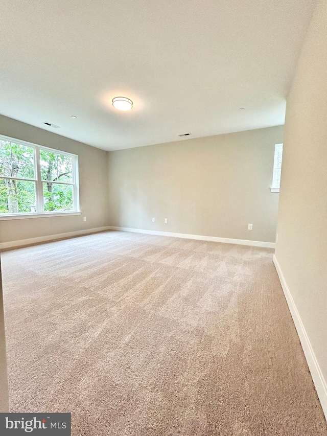 4655 Mountain Rd, Pasadena, MD 21122 - spare room featuring carpet and baseboards