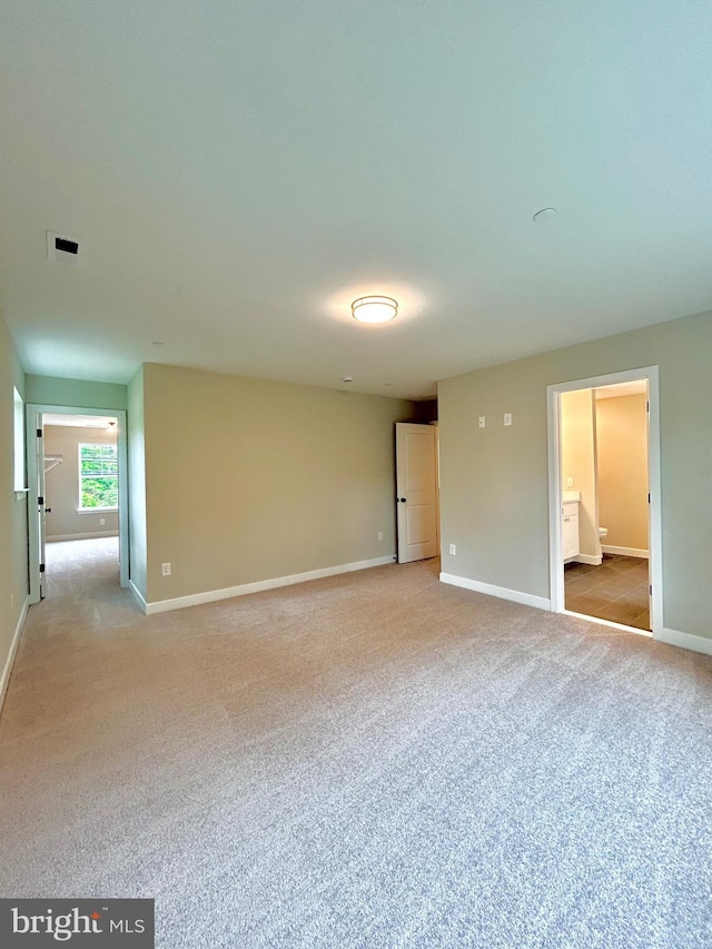 4655 Mountain Rd, Pasadena, MD 21122 - empty room featuring light colored carpet and baseboards