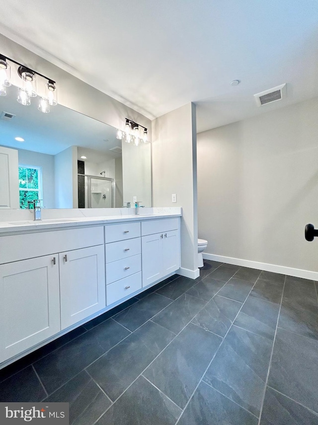 4655 Mountain Rd, Pasadena, MD 21122 - bathroom with a shower stall, double vanity, toilet, and baseboards