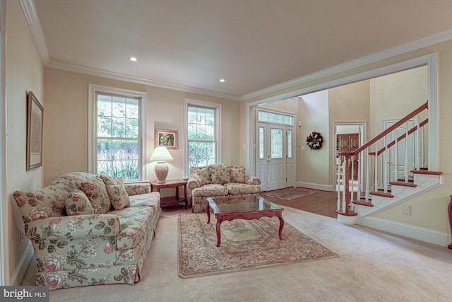 living room with crown molding, baseboards, stairs, and recessed lighting