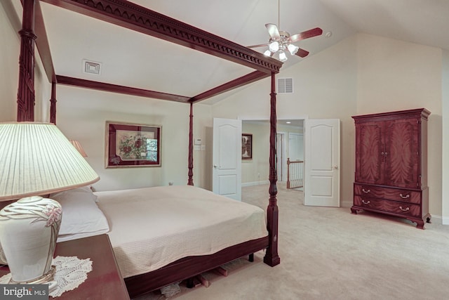 bedroom with vaulted ceiling, light colored carpet, ceiling fan, and baseboards
