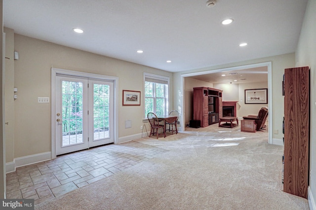 interior space with recessed lighting and baseboards