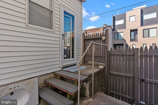 exterior space featuring a gate and fence