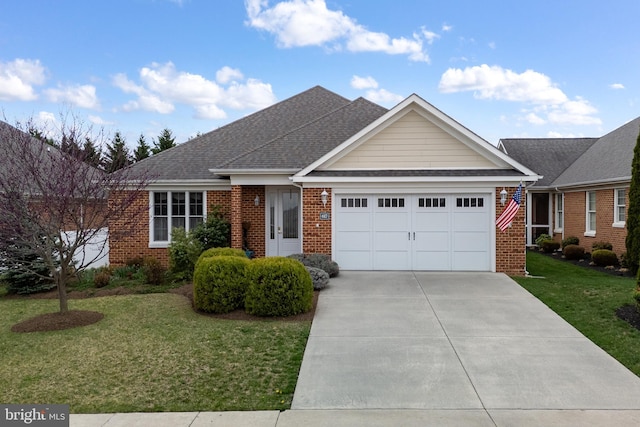 617 Redbud Ln, Woodstock, VA 22664 - view of front of house featuring a front lawn, an attached garage, brick siding, and concrete driveway