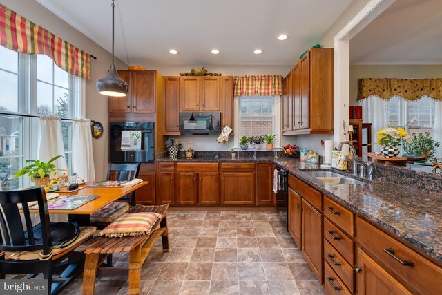617 Redbud Ln, Woodstock, VA 22664 - kitchen with plenty of natural light, black appliances, a sink, and brown cabinetry