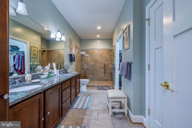 617 Redbud Ln, Woodstock, VA 22664 - bathroom with double vanity, a sink, and a shower stall