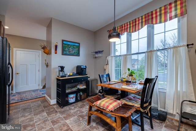 617 Redbud Ln, Woodstock, VA 22664 - dining space with baseboards and stone finish floor