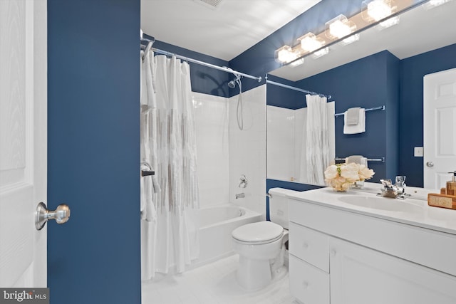 bathroom with shower / bath combo with shower curtain, toilet, vanity, and tile patterned flooring