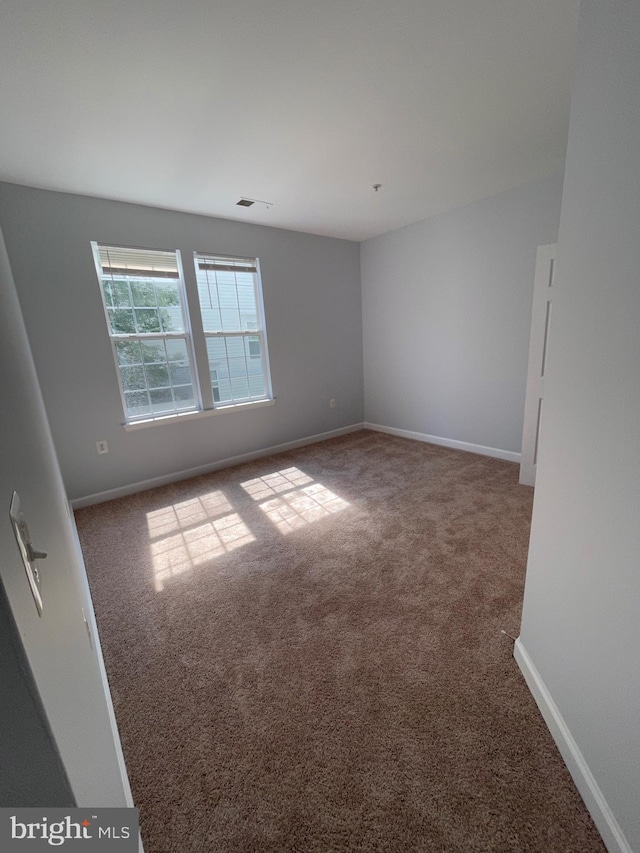 42480 Rockrose Sq Unit 202, Brambleton, VA 20148 - empty room featuring carpet floors and baseboards