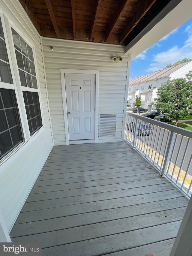 42480 Rockrose Sq Unit 202, Brambleton, VA 20148 - wooden terrace featuring a residential view