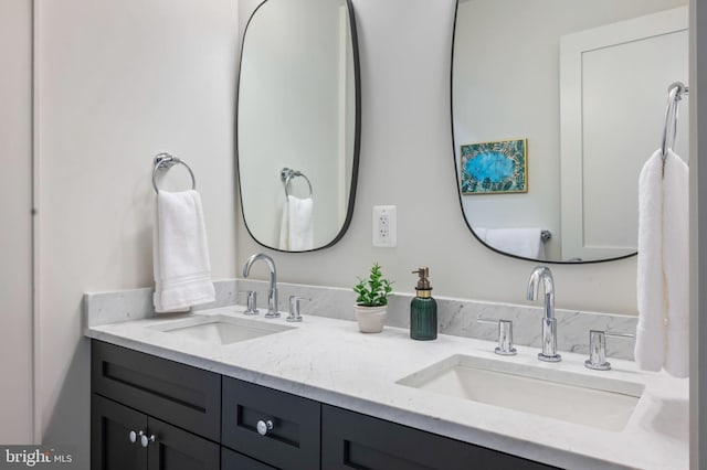 full bathroom with double vanity