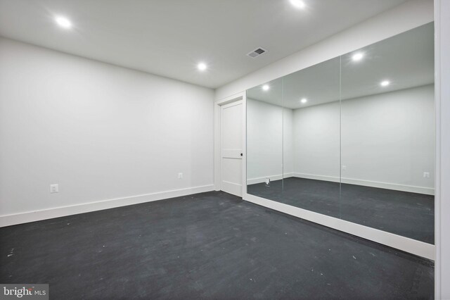 finished below grade area featuring recessed lighting and baseboards