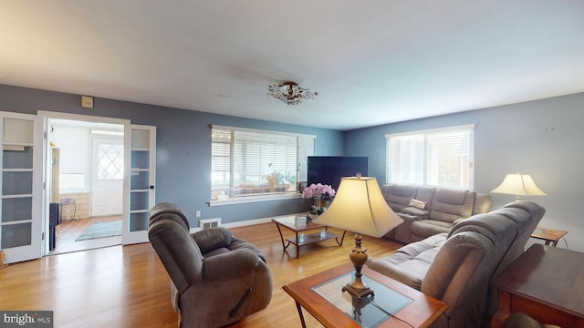 6103 Manor Rd, Clinton, MD 20735 - living room featuring light wood-style floors