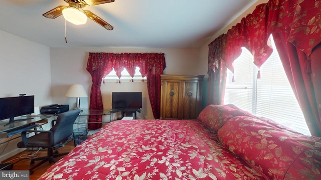 6103 Manor Rd, Clinton, MD 20735 - bedroom with an office area and a ceiling fan