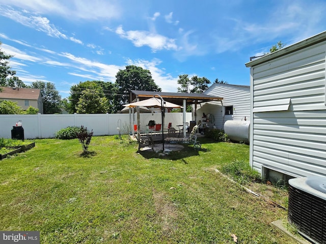 6103 Manor Rd, Clinton, MD 20735 - view of yard with central air condition unit and a patio area