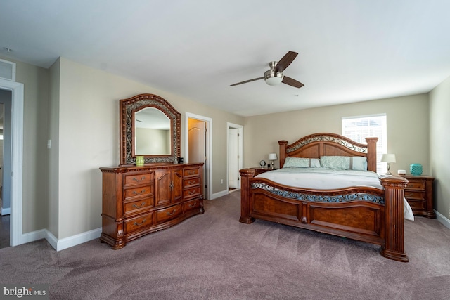 bedroom with visible vents, baseboards, a ceiling fan, and carpet floors