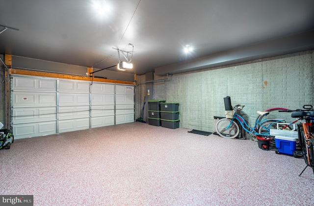 garage featuring a garage door opener