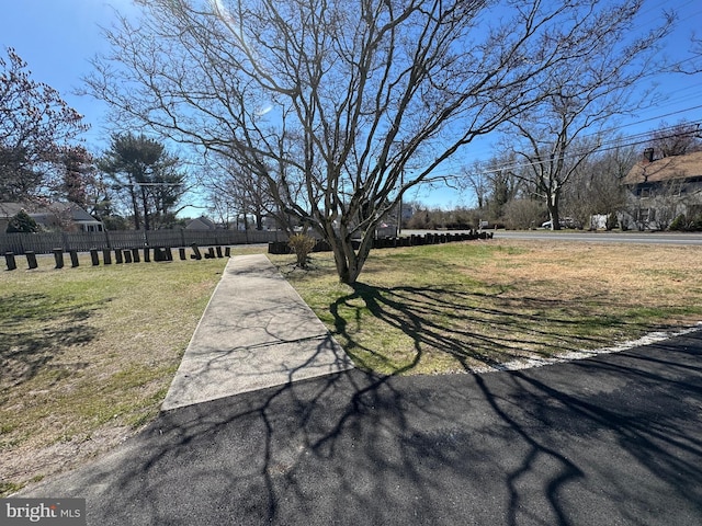 view of yard featuring fence