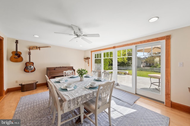 dining area featuring baseboards, a ceiling fan, light wood-style floors, and recessed lighting