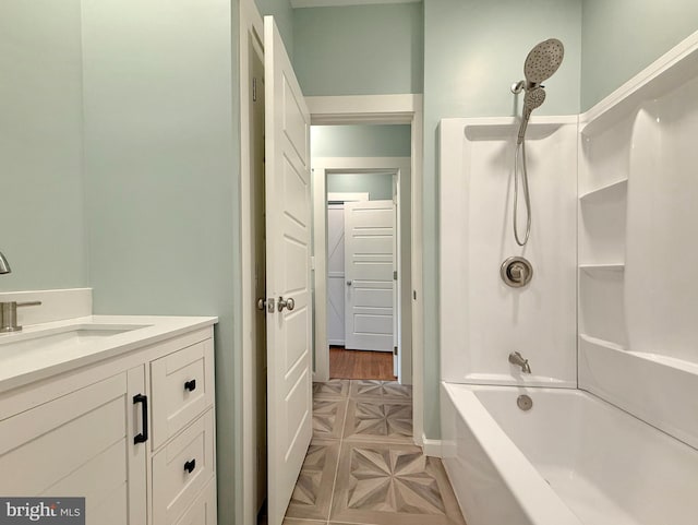 full bathroom with tub / shower combination and vanity