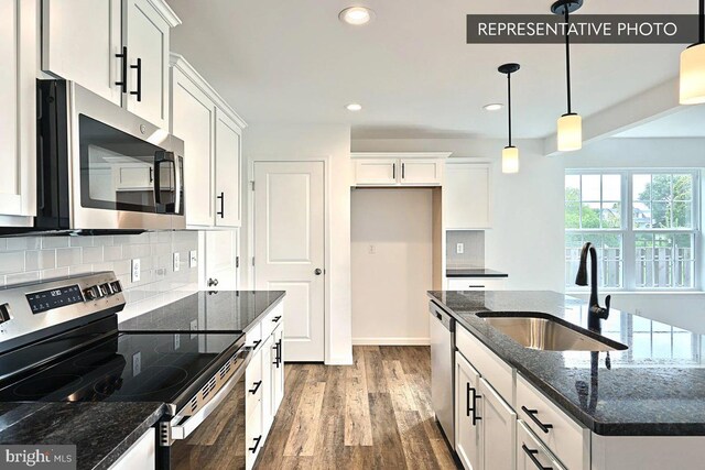 346 Acer Ave Lot 728B, State College, PA 16803 - kitchen with tasteful backsplash, stainless steel appliances, a sink, white cabinets, and wood finished floors