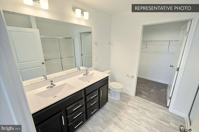 346 Acer Ave Lot 728B, State College, PA 16803 - bathroom with double vanity, a sink, a stall shower, and toilet
