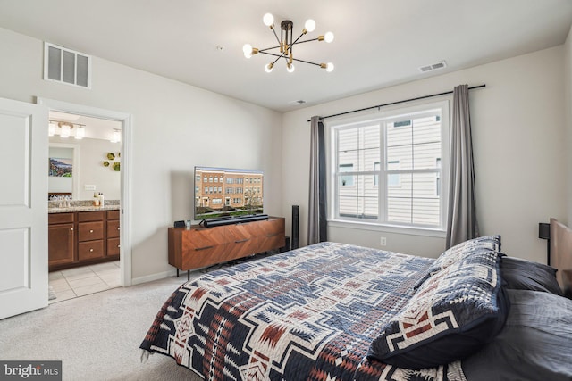 bedroom with visible vents, an inviting chandelier, and light carpet