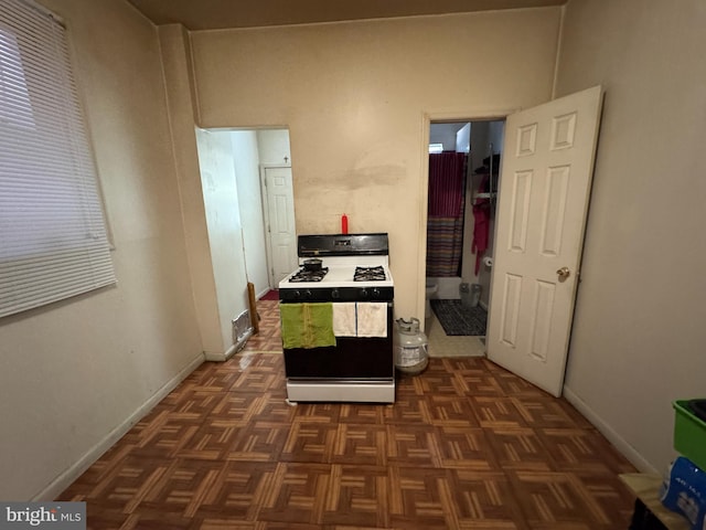 5259 N 5th St, Philadelphia, PA 19120 - kitchen with baseboards and range with gas stovetop
