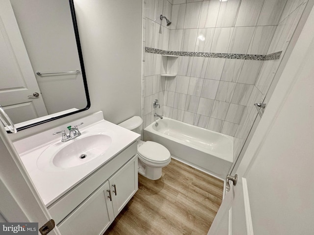 9871 La Plata Pkwy, La Plata, MD 20646 - full bath featuring shower / tub combination, wood finished floors, toilet, and vanity