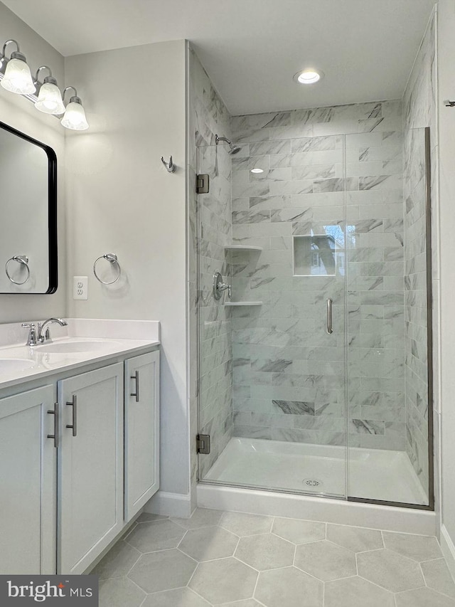 9871 La Plata Pkwy, La Plata, MD 20646 - full bath with baseboards, a stall shower, tile patterned flooring, and vanity
