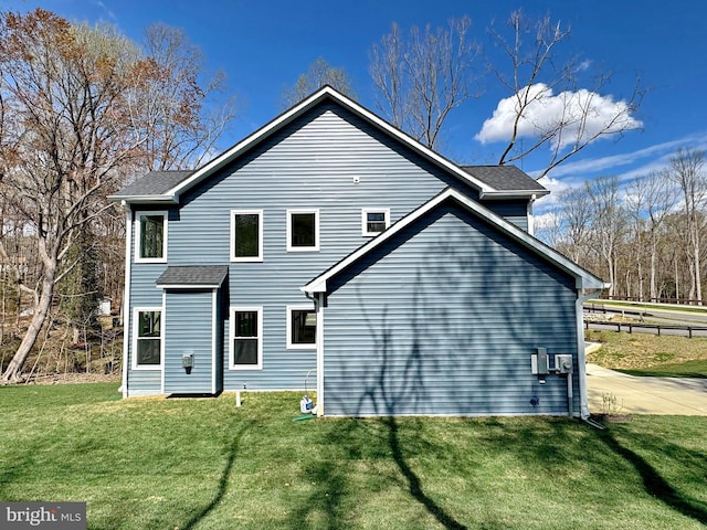 9871 La Plata Pkwy, La Plata, MD 20646 - back of property featuring a shingled roof and a yard