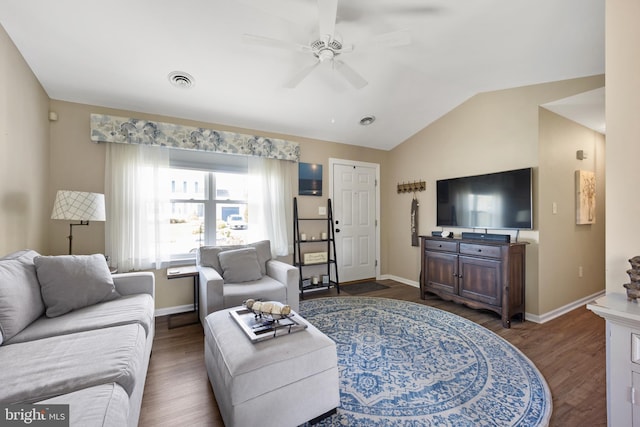 living area featuring dark wood-style flooring, baseboards, visible vents, lofted ceiling, and ceiling fan