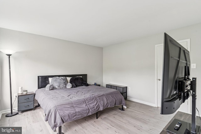 4647 6th St SE, Washington, DC 20032 - bedroom featuring light wood-style flooring and baseboards