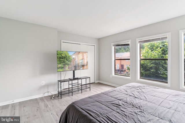 4647 6th St SE, Washington, DC 20032 - bedroom featuring wood finished floors and a closet