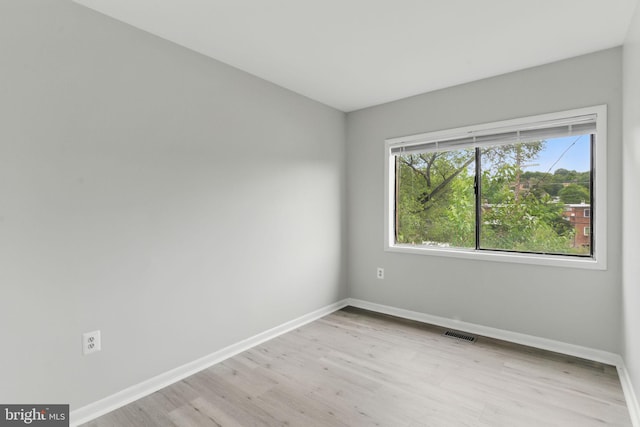 4647 6th St SE, Washington, DC 20032 - unfurnished room with baseboards and light wood-type flooring
