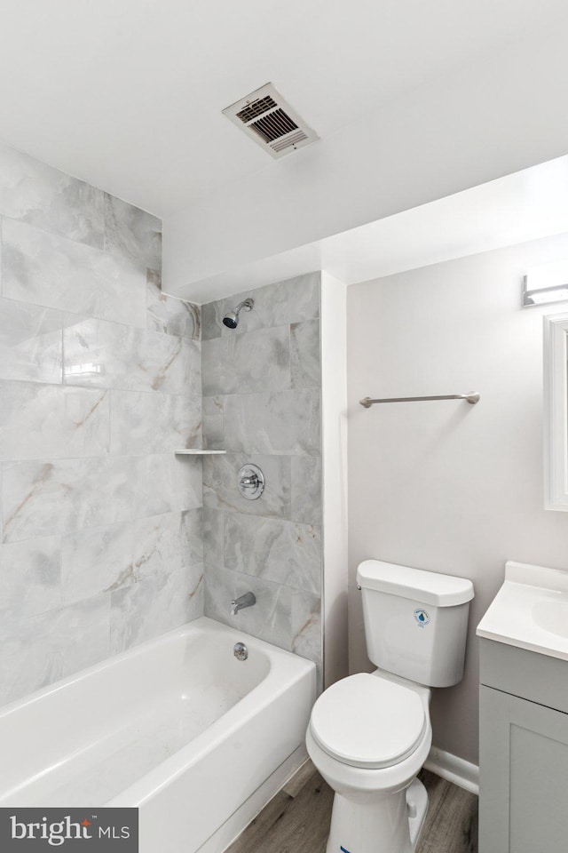 4647 6th St SE, Washington, DC 20032 - bathroom featuring vanity, wood finished floors, and washtub / shower combination