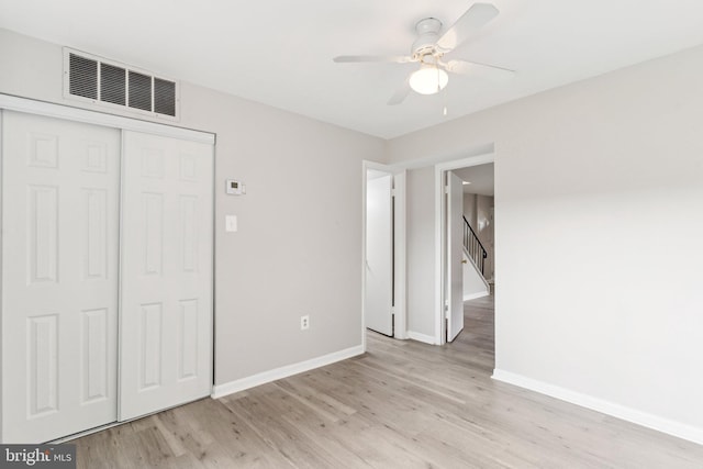 4647 6th St SE, Washington, DC 20032 - unfurnished bedroom featuring light wood finished floors, a closet, and a ceiling fan