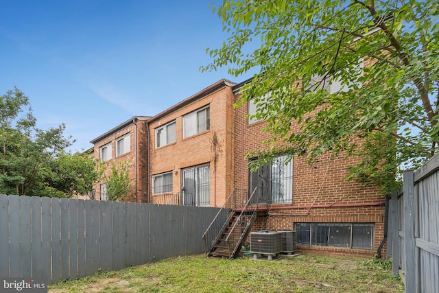 4647 6th St SE, Washington, DC 20032 - back of property featuring brick siding and stairs