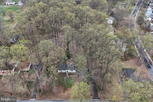 aerial view featuring a forest view