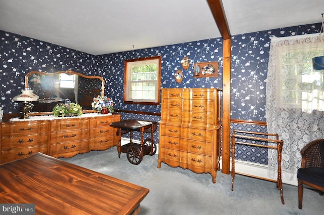 carpeted bedroom featuring wallpapered walls