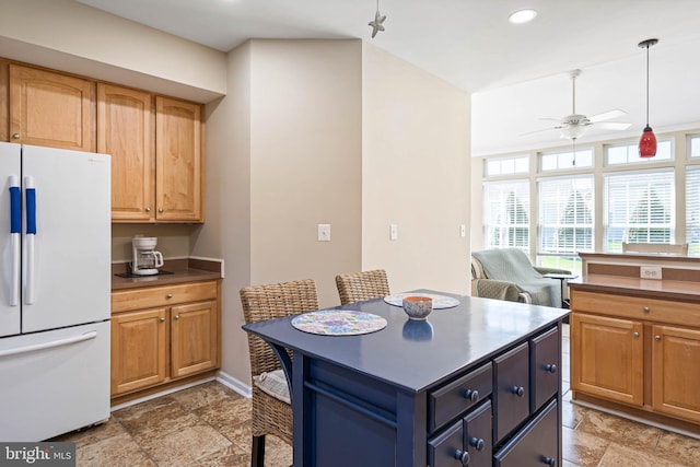 37959 Bayview Cir E, Selbyville, DE 19975 - kitchen featuring baseboards, recessed lighting, freestanding refrigerator, stone tile flooring, and ceiling fan