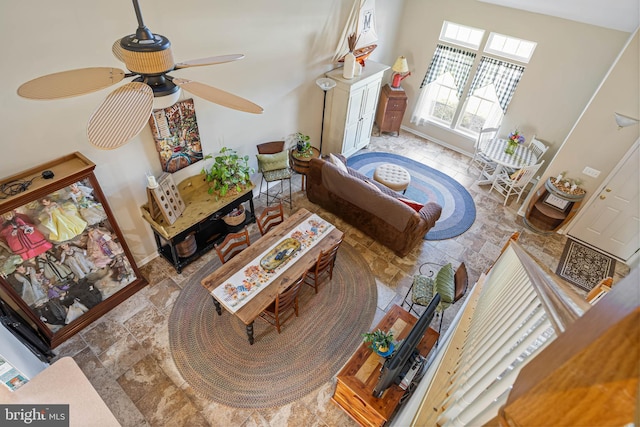 37959 Bayview Cir E, Selbyville, DE 19975 - living room with stone finish floor, baseboards, and a ceiling fan