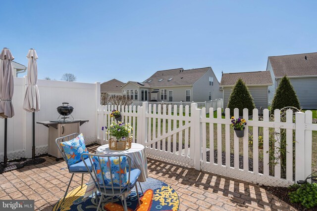 37959 Bayview Cir E, Selbyville, DE 19975 - view of patio with a residential view and fence private yard