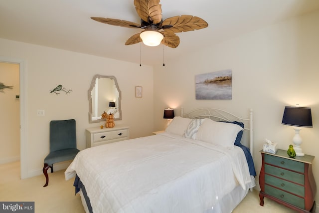 119 Bald Eagle Dr, Montross, VA 22520 - bedroom featuring baseboards, ceiling fan, and light colored carpet