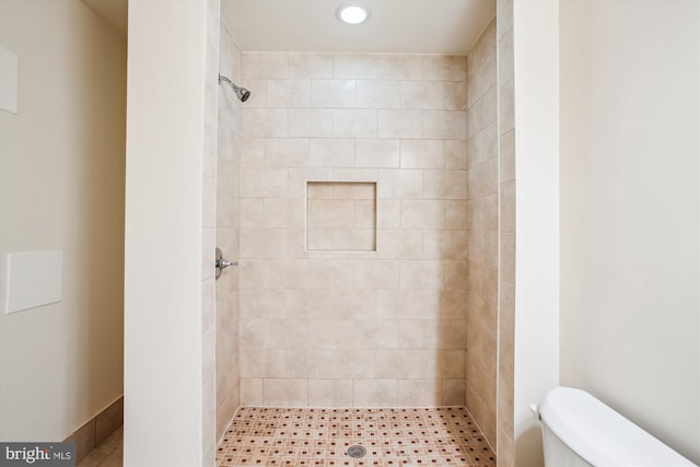full bath with recessed lighting, a shower stall, and toilet