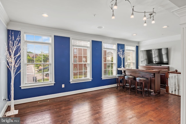 15343 Tewkesbury Pl, Upper Marlboro, MD 20774 - indoor dry bar with ornamental molding, plenty of natural light, baseboards, and hardwood / wood-style floors