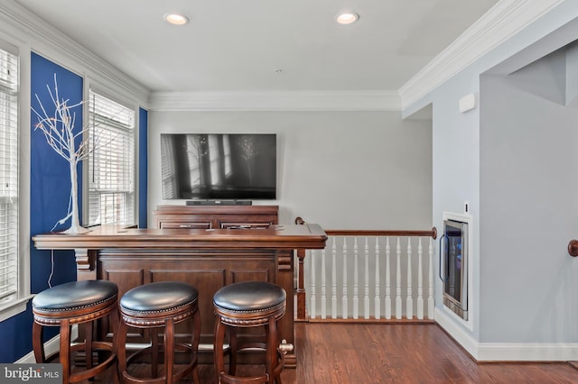 15343 Tewkesbury Pl, Upper Marlboro, MD 20774 - indoor dry bar with wood finished floors, ornamental molding, baseboards, recessed lighting, and beverage cooler